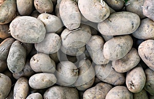 Raw potatoes background
