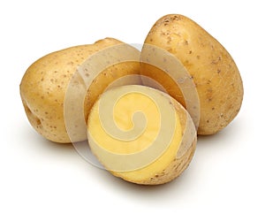 Raw potatoes and half potato