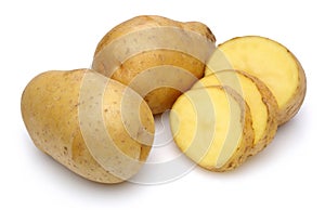 Raw potatoes and sliced potatoes