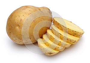 Raw potatoes and sliced potatoes