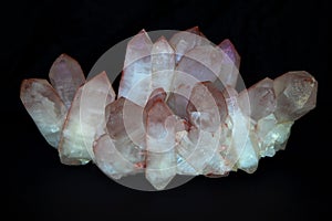 , raw quartz crystal on black background