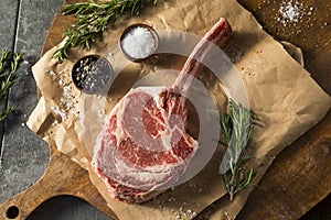 Raw Red Grass Fed Tomahawk Steaks photo