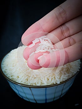 Raw rice in hand