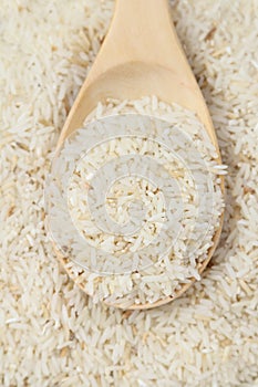 Raw rice and spoon