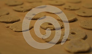 Raw round cookies some with hole inside