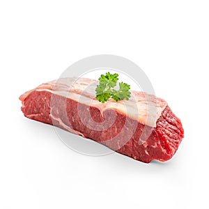 Raw rump steak with parsley twig isolated