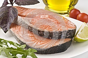 Raw salmon steak with herbs