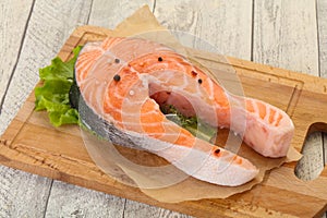 Raw salmon steak - ready for grill