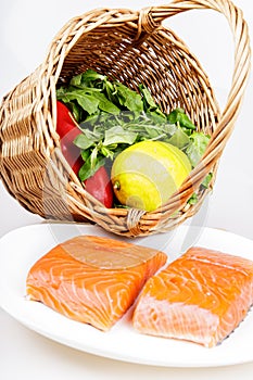 Raw salmon steaks with ingredients