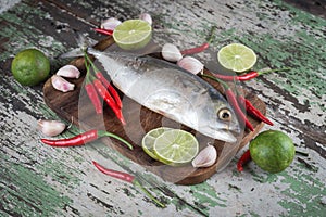 Raw salt mackerel fish with vegetables