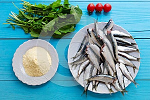 Raw sardines, vegetables and and cornflour