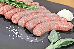 Raw sausages with herbs