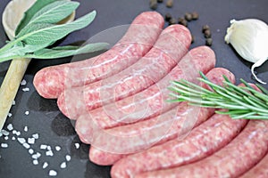 Raw sausages with herbs