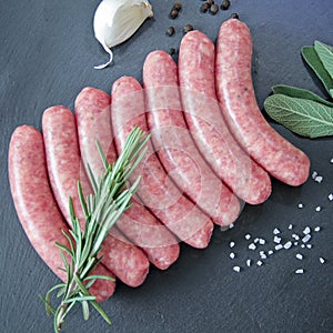 Raw sausages with herbs