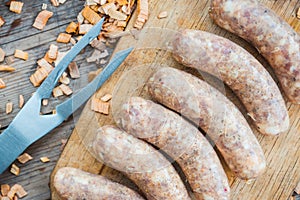 Raw sausages ready for grill