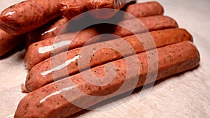 raw sausages rotating