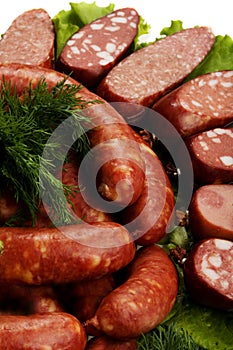 Raw sausages and vegetables