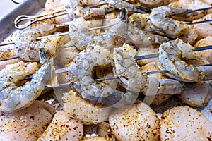 Raw scallops and shrimp prepared for party