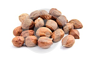 Raw shelled hezelnuts or filberts isolated on white