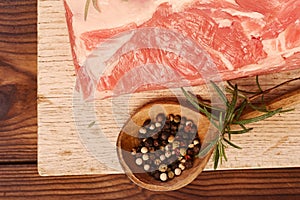 raw shoulder lamb on wooden board photo