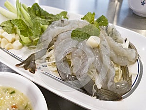 Raw shrimp in fish sauce