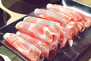 Raw sliced beef for shsbu-shabu on dish