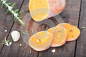 Raw sliced sweet potatoes