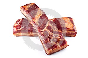 Raw smoked bacon whole piece isolated on white