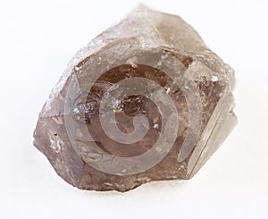 raw smoky quartz ( morion) crystal on white