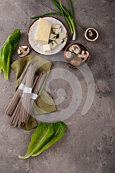 Raw soba noodles and cooking ingredient