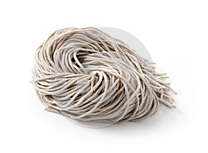 Raw soba noodles placed on a white background