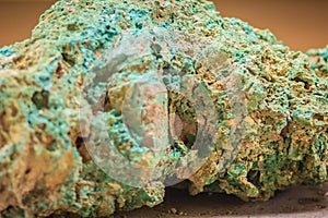 Raw specimen of Malachite stone from mining and quarrying industries. Malachite is a copper carbonate hydroxide mineral, with