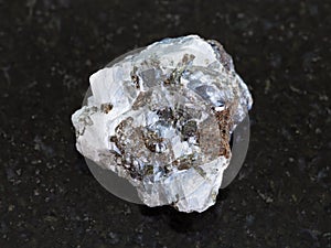 raw sphalerite (zinc blende) stone on dark