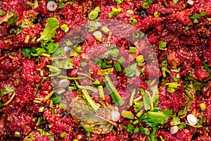 Raw spicy Thai minced beef salad, Northeast Thailand food culture.