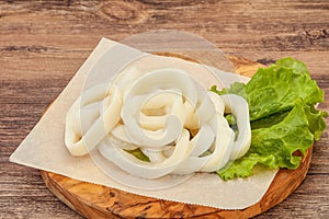 Raw squid rings for cooking