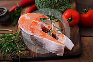 Raw steak salmon and vegetables