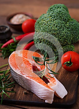 Raw steak salmon and vegetables