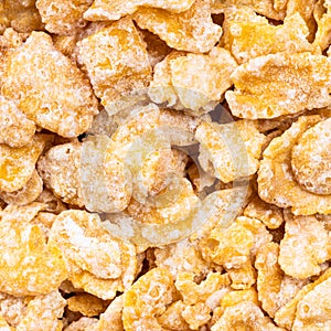 Raw sugar coated cornflakes close up