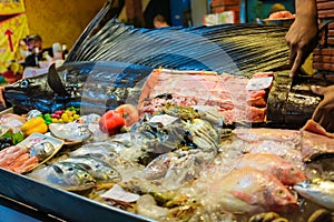 Raw sward fish on ice selling in fresh seafood market at Lipe is