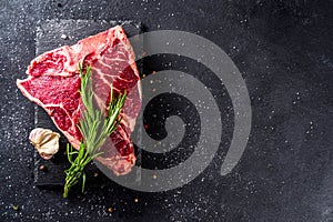 Raw t-bone steak