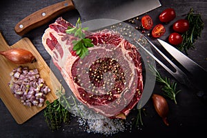 Raw T Bone steak entrecote prepared to Grill on turntable