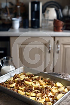 Raw tartiflette in the baking tray vertical