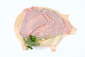 Raw tenderized pork chops