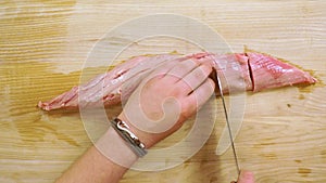 Raw tenderloin steak on the wood desk