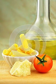 Raw tortiglioni pasta with other ingredients