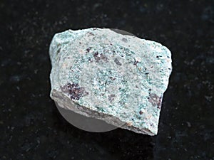 raw Trachyte stone on dark background