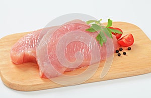 Raw turkey breast steaks