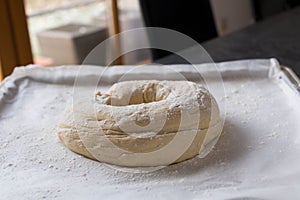 Raw ciabatta bread on a baking tray. Ready to bake