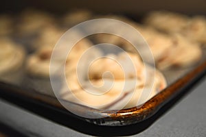 raw unbaked dough chocolate babka twist danish buns with chocolate on a pan abstract close up with bohkeh