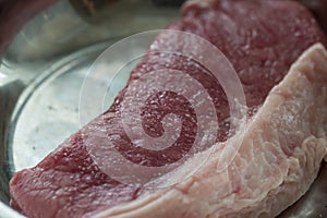 Raw uncooked beef steak